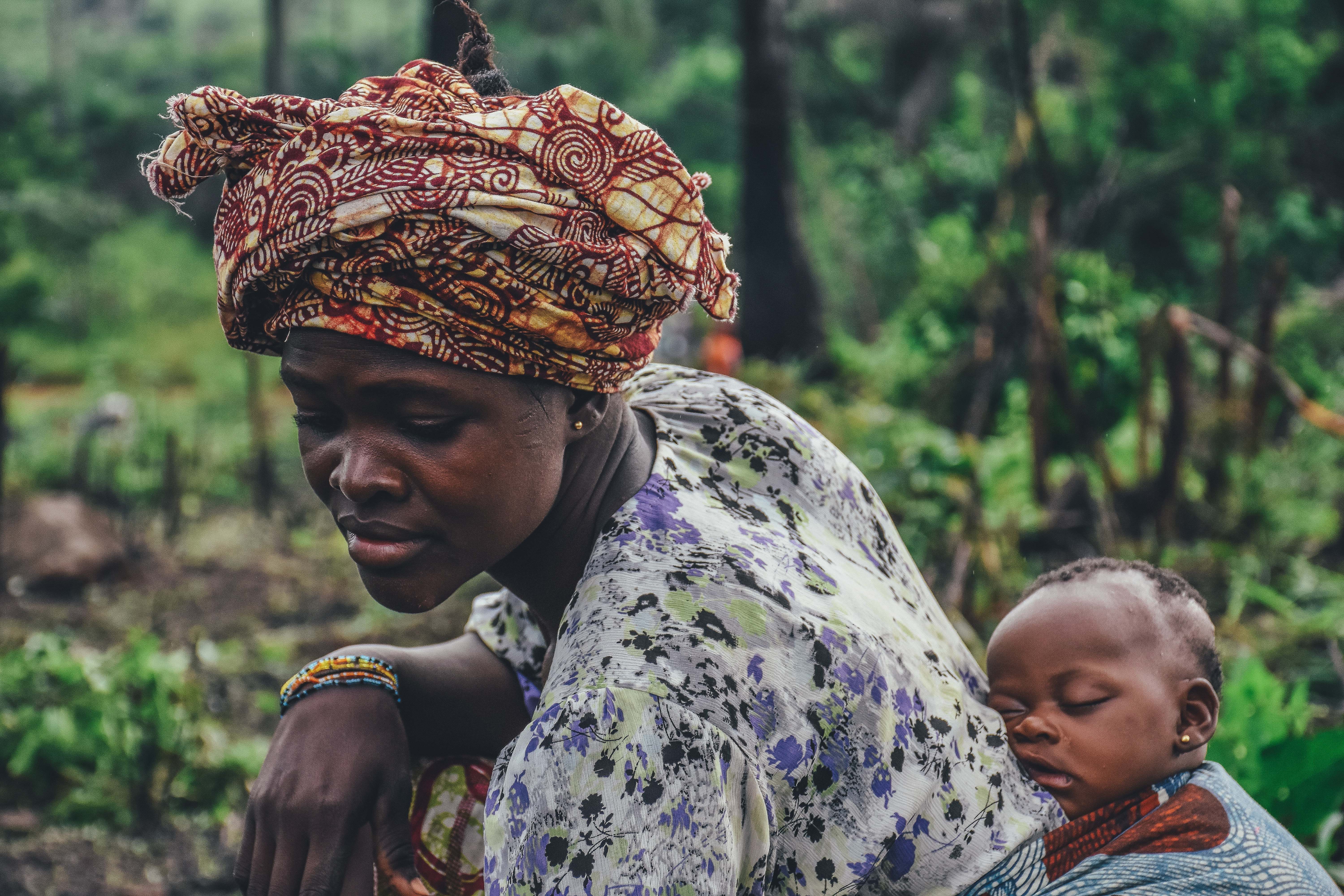 Woman farmer with baby